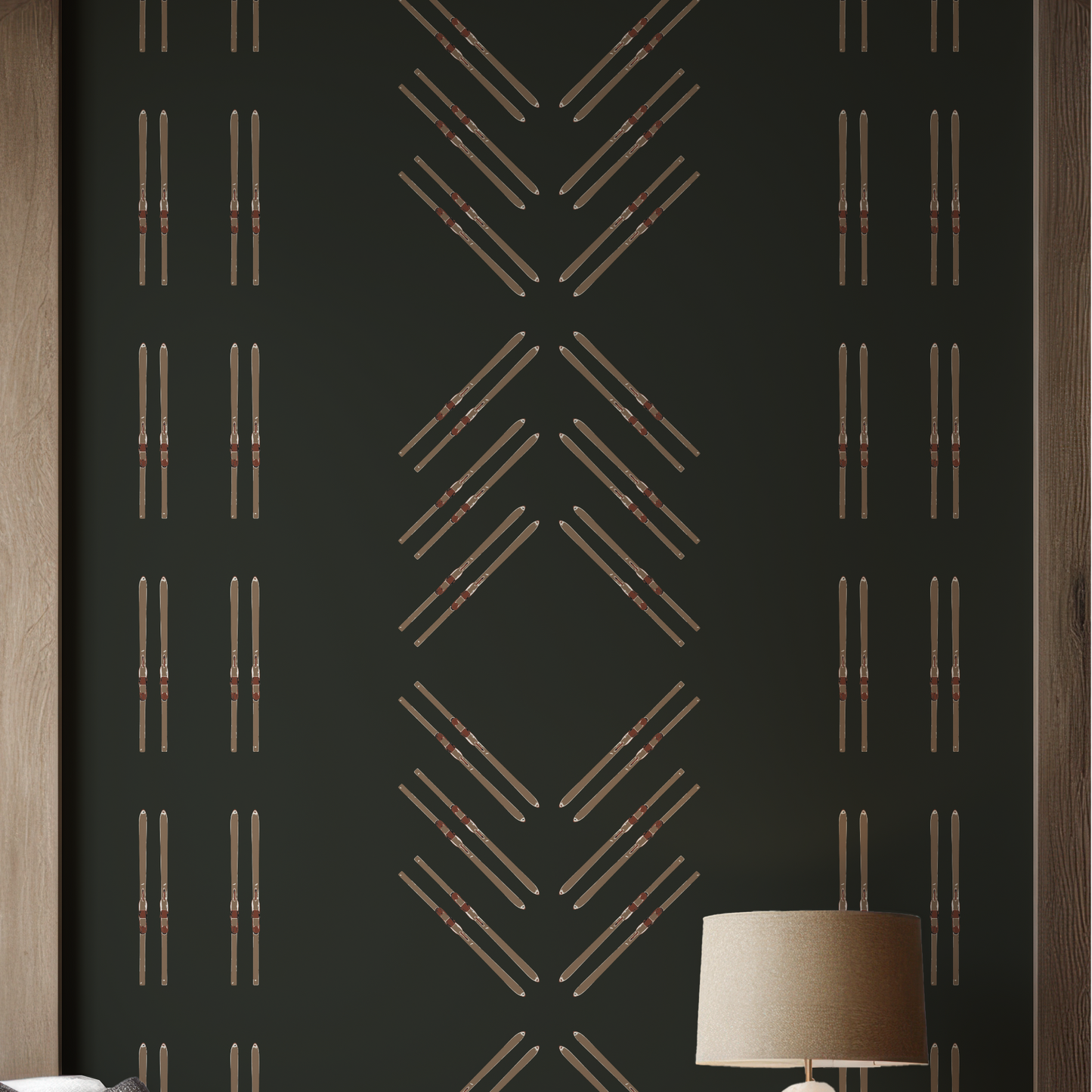 Close-up of vintage skis and diamond pattern on forest green grasscloth wallpaper